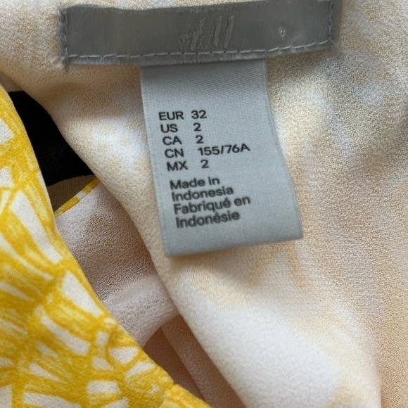 High Neck Floral Mini Dress with a tie around the back if the Neck - Picture 3 of 3